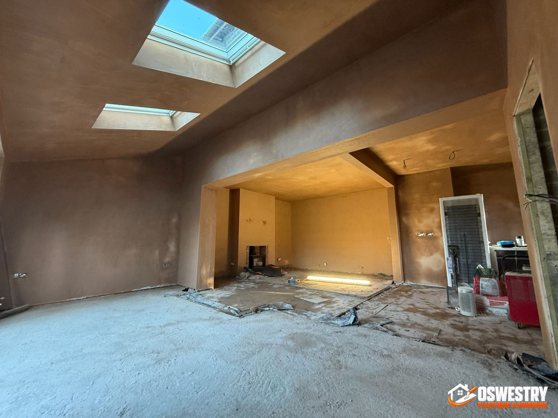 Two-storey detached property finished in clean white silicone render with crisp reveals